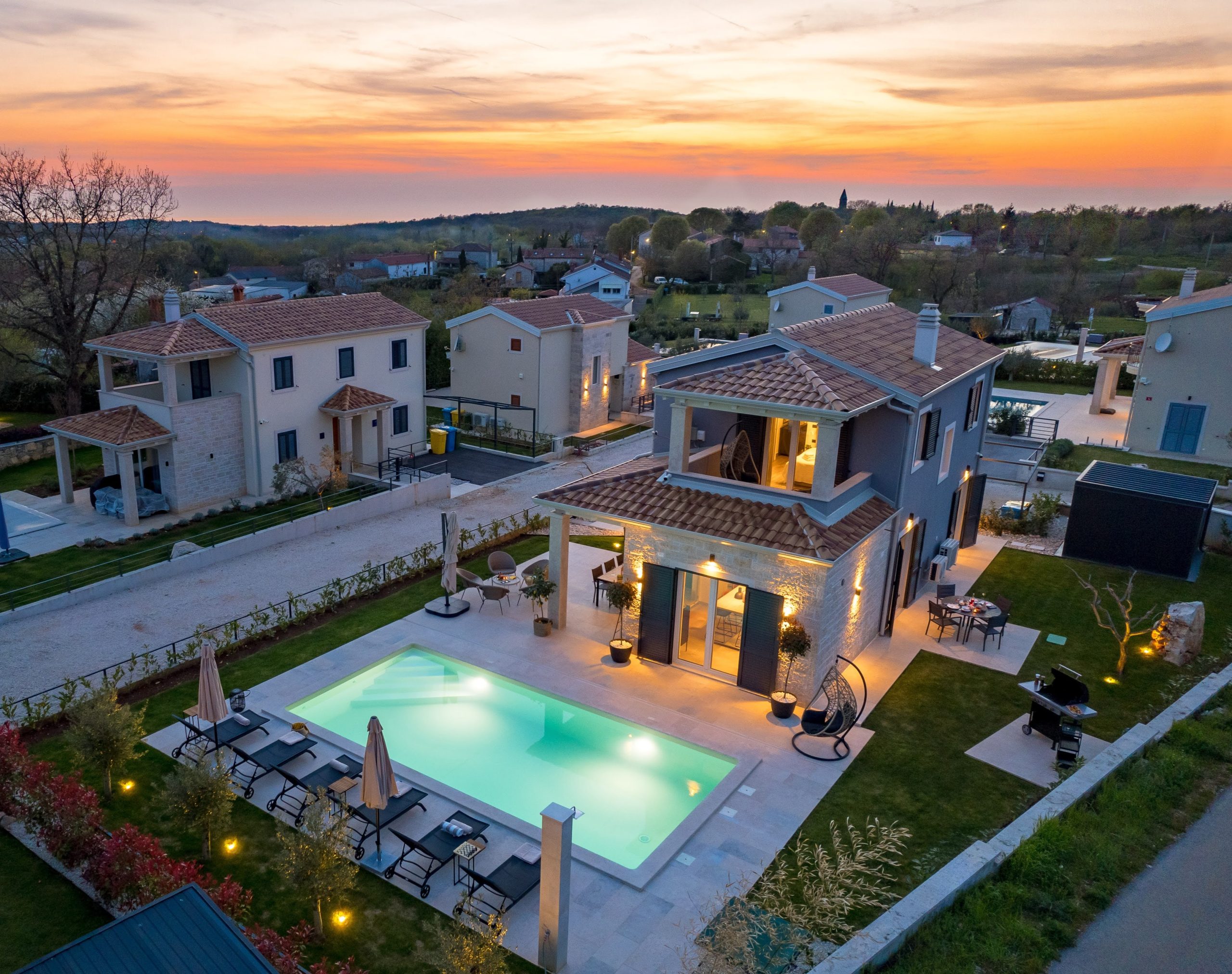 Aerial sunset view over the villa and Istrian village