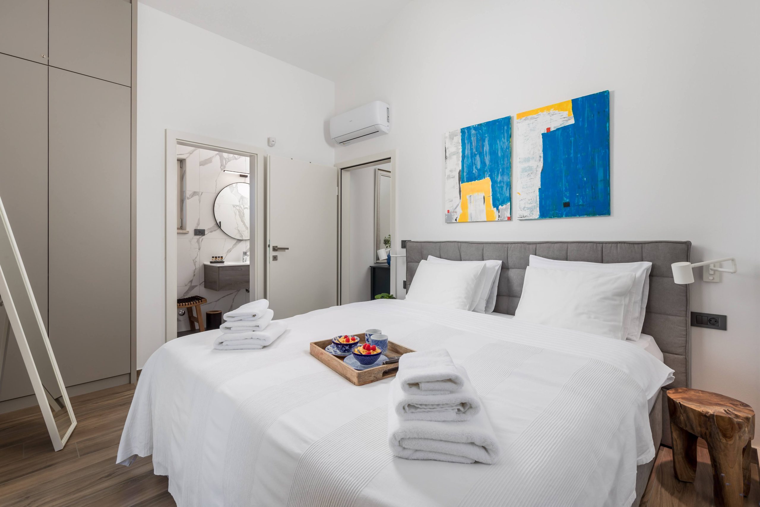 Bedroom with view into the ensuite bathroom