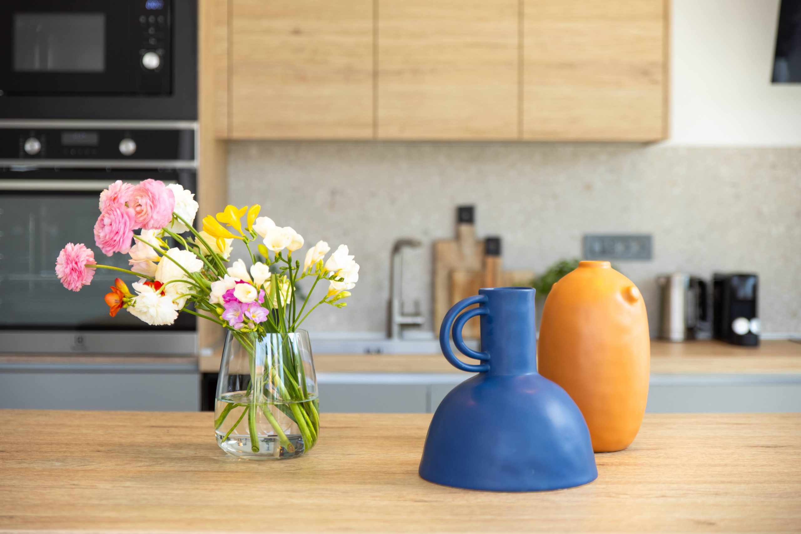Kitchen counter detail with fresh flowers