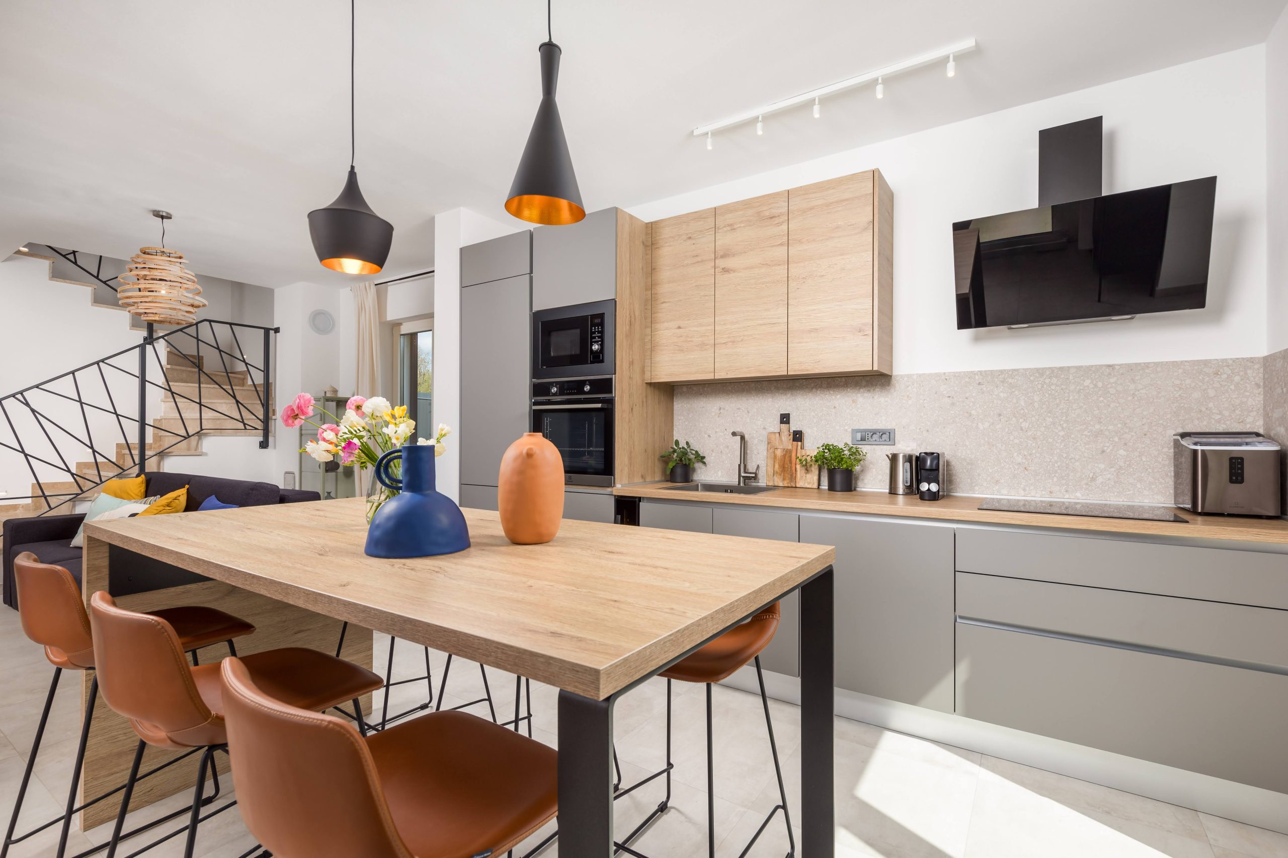 Kitchen with wood cabinets and dining table