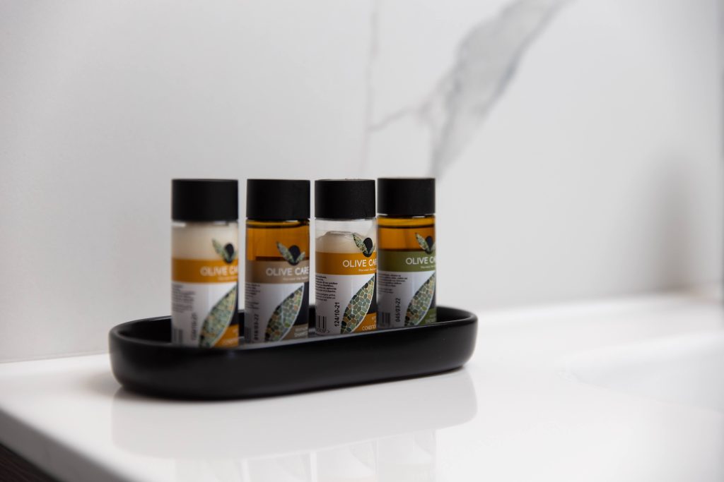 Olive-based bathroom amenities in the ensuite bathroom