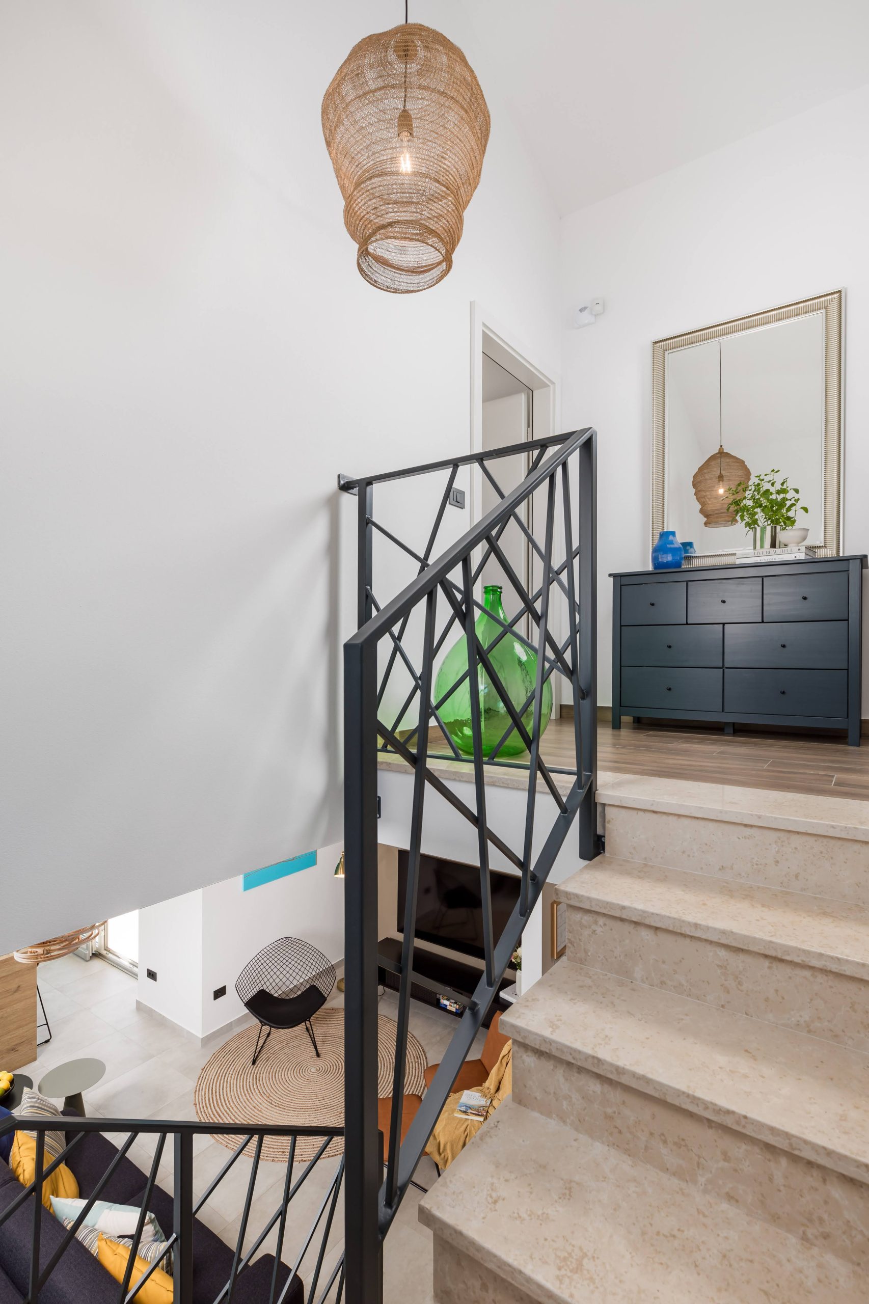 Staircase landing with console table and decor